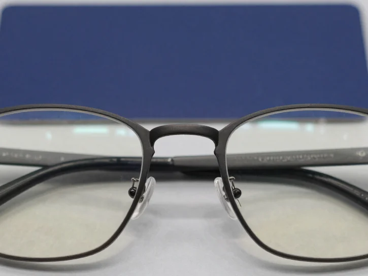 Close editorial photograph of a pair of clear lenses resting on a